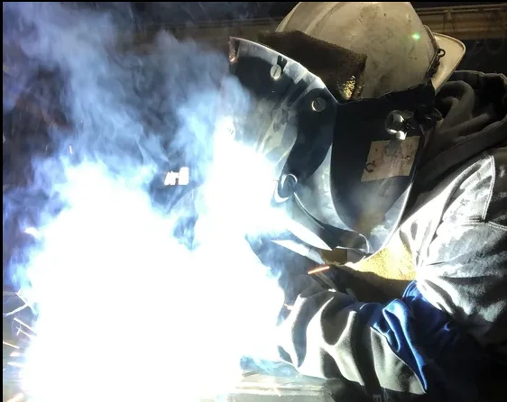 Welder performing custom fabrication